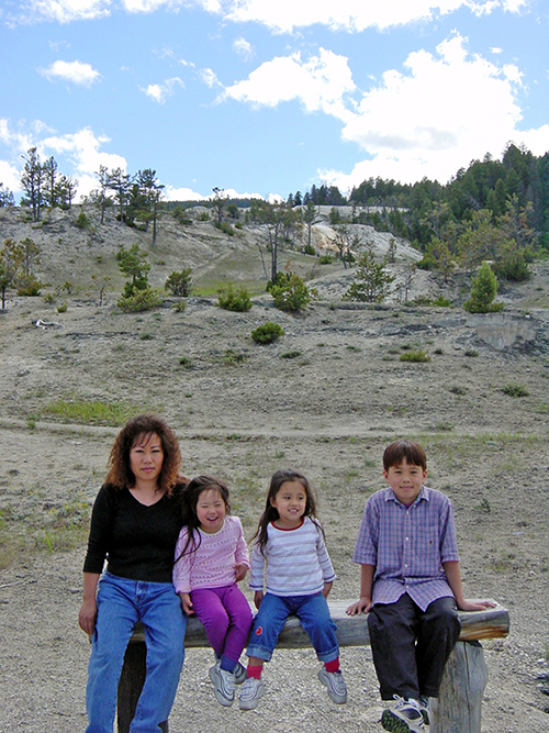 Hui Cha Stanek with the children at Yellowstone, circa 2002